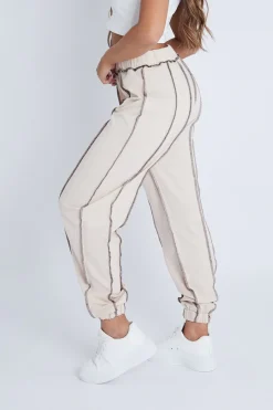Rebellious Fashion Beige Contrast Stitch Joggers - Roaa
