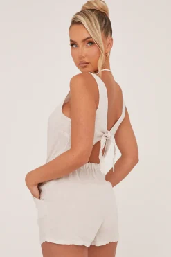 Rebellious Fashion Beige Elasticated Waist Tie Back Playsuit - Jovee
