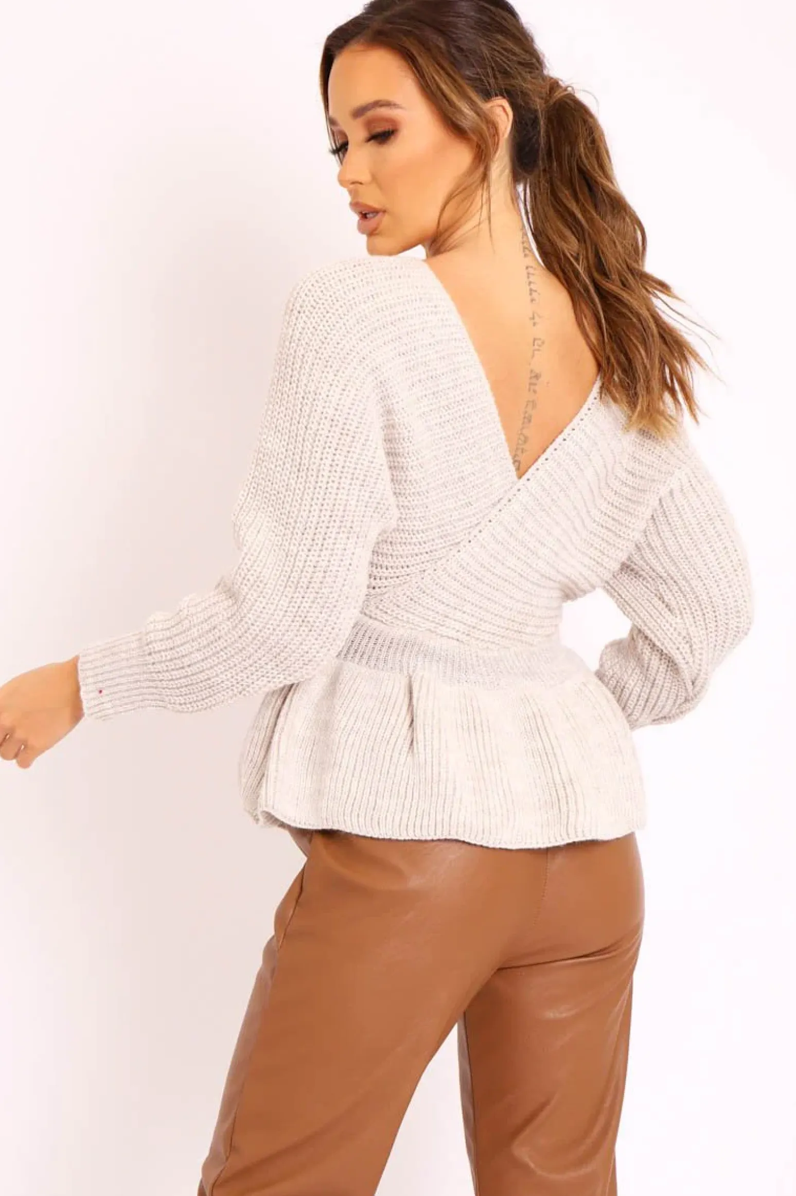 Rebellious Fashion Beige Knitted Wrap Front Plunge Peplum Jumper - Samara
