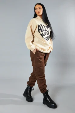 Rebellious Fashion Beige Oversized Slogan Hoodie - Sora