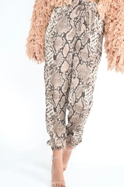 Rebellious Fashion Beige Snake Print Tie Waist Cuffed Trousers - Annica