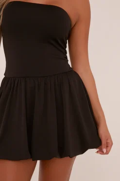 Rebellious Fashion Black Bandeau Drop Waist Puffball Detail Mini Dress - Saffiya