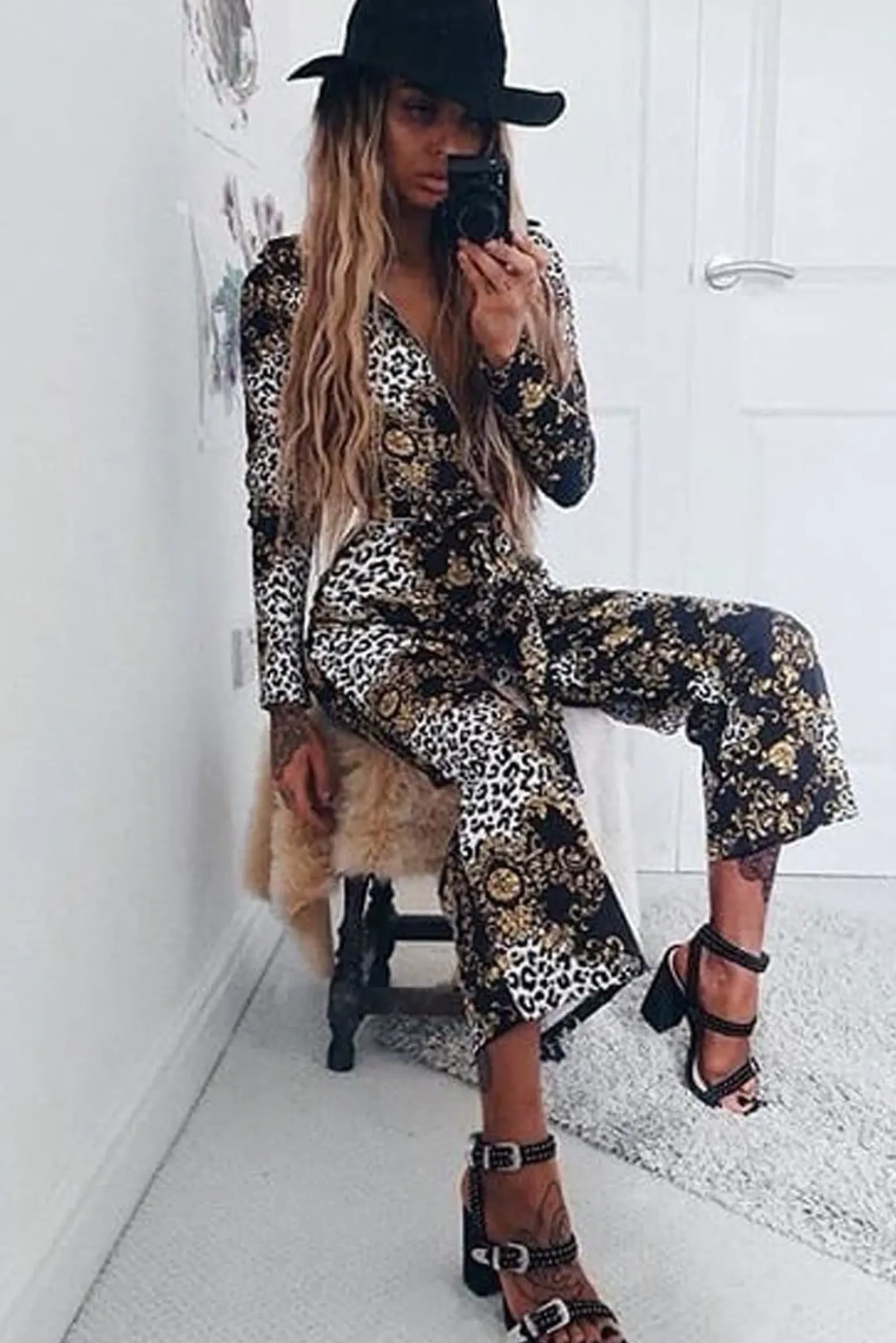 Rebellious Fashion Black and Gold Leopard Print Zip Front Jumpsuit - Aazeen