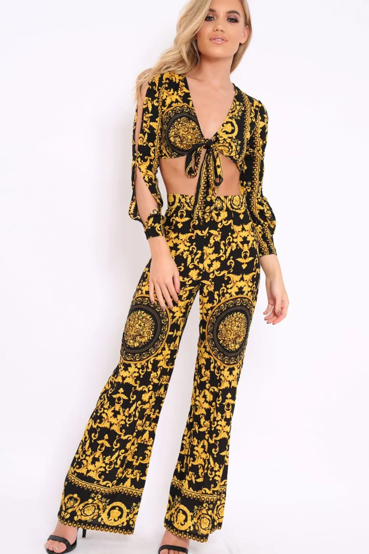 Rebellious Fashion Black and Gold Print High Waist Flare Trousers -Tisha