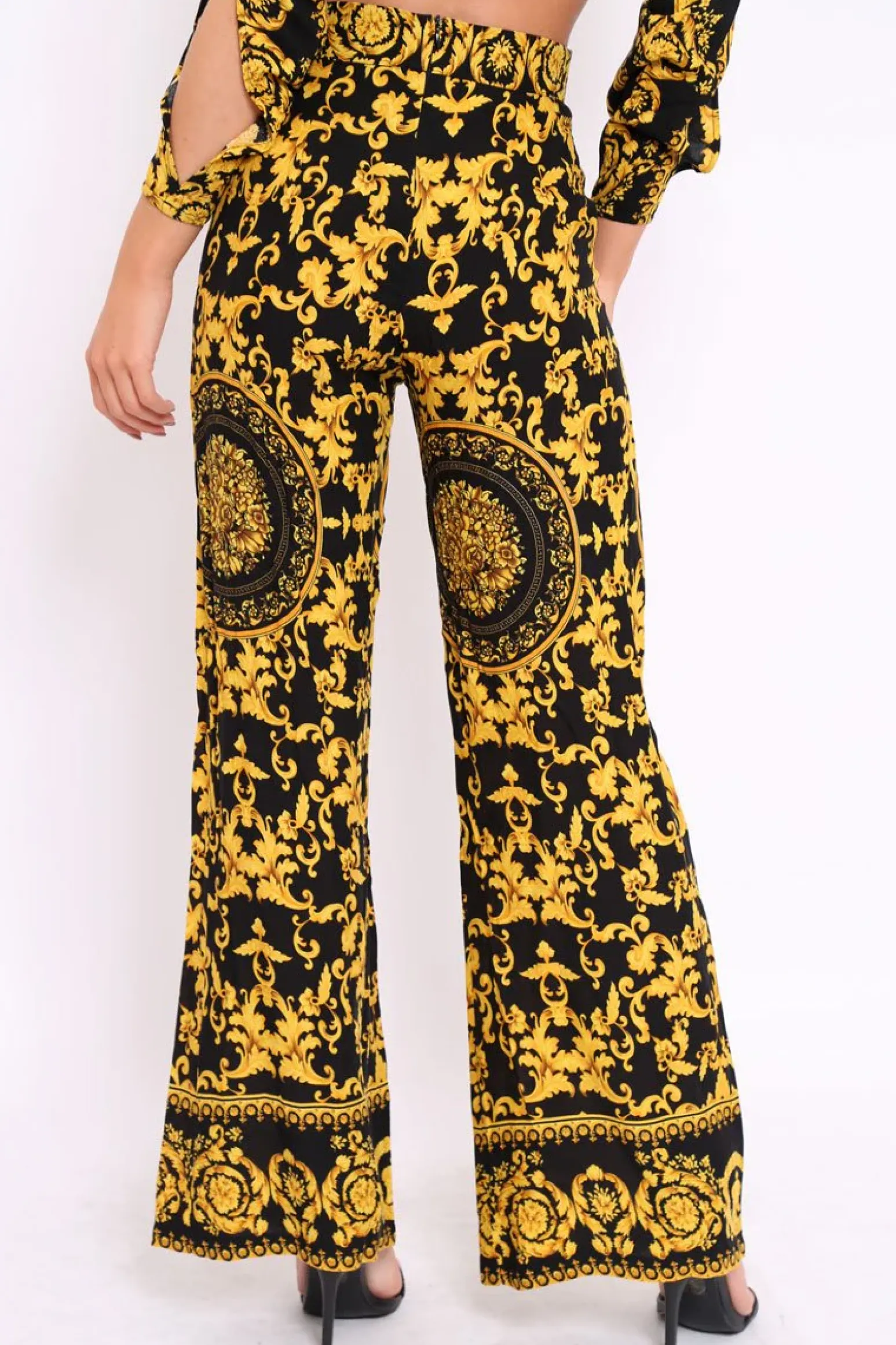 Rebellious Fashion Black and Gold Print High Waist Flare Trousers -Tisha