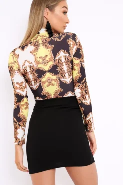 Rebellious Fashion Black and Gold Scarf Print Wrap Front Bodysuit - Jasmina