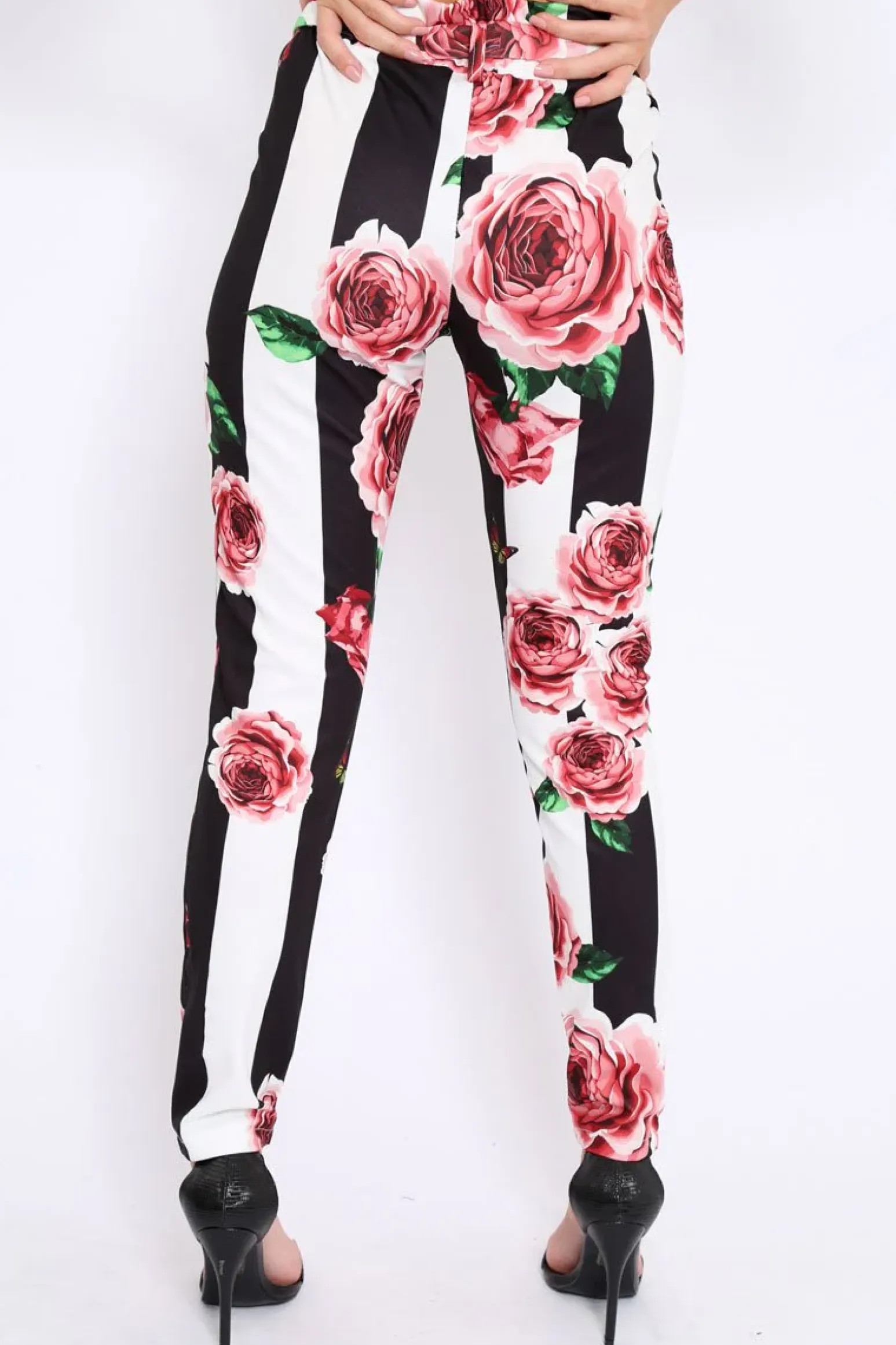 Rebellious Fashion Black and White Striped Floral Tapered Trousers - Ledora