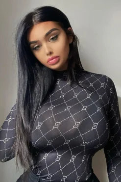 Rebellious Fashion Black Cross Stitch Pattern Fitted Bodysuit - Bali