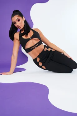 Rebellious Fashion Black Cut Out Halter Neck Crop Top & Flare Trouser Set - Ariel
