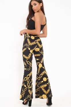 Rebellious Fashion Black Gold Chain Print Flared Trousers - Brooke