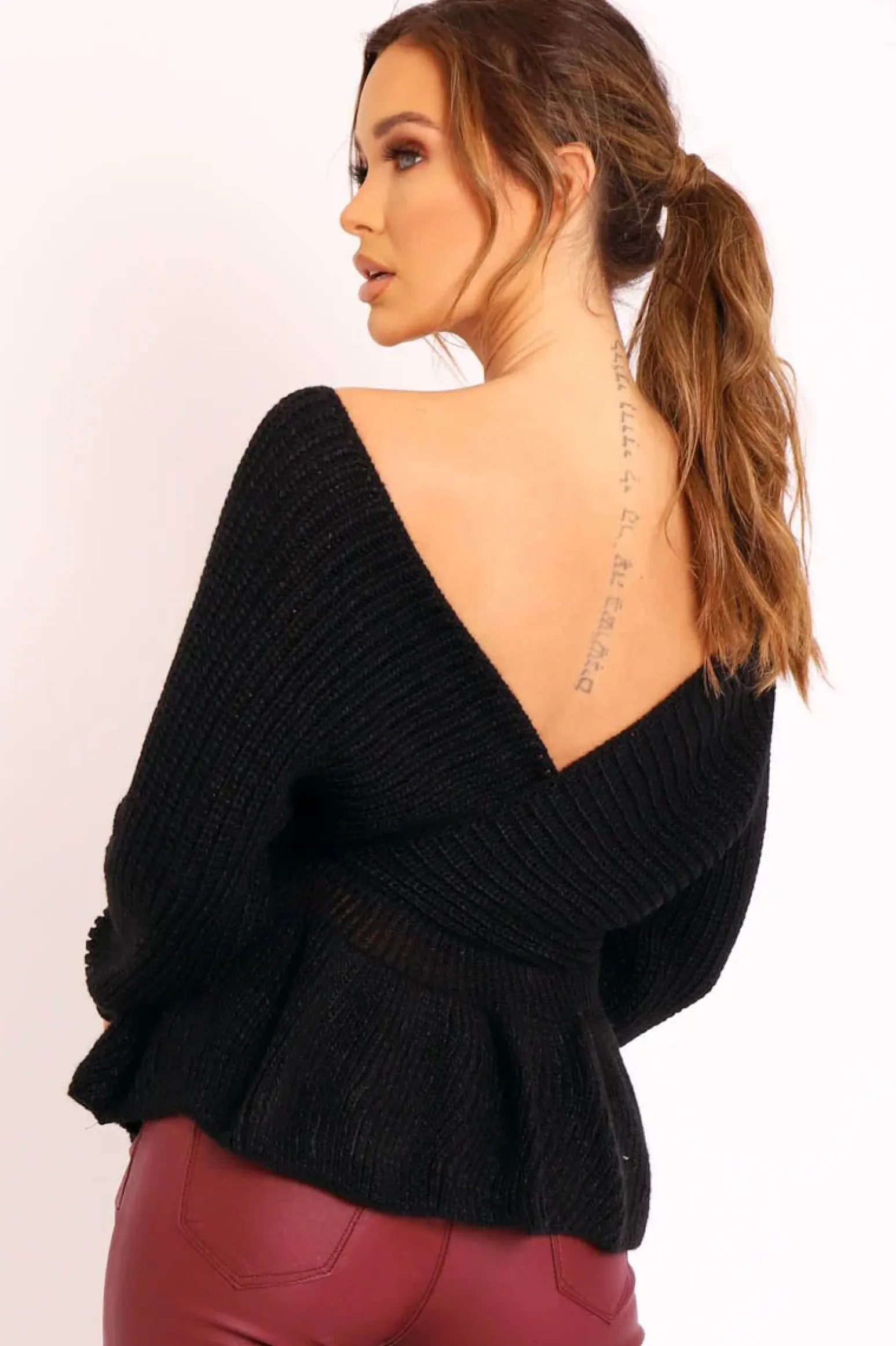 Rebellious Fashion Black Knitted Wrap Front Plunge Peplum Jumper - Samara