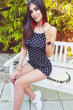 Rebellious Fashion Black Polka Dot Halterneck Frill Playsuit - Tilly