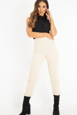 Rebellious Fashion Black Rib High Neck Cut Out Back Bodysuit - Leara