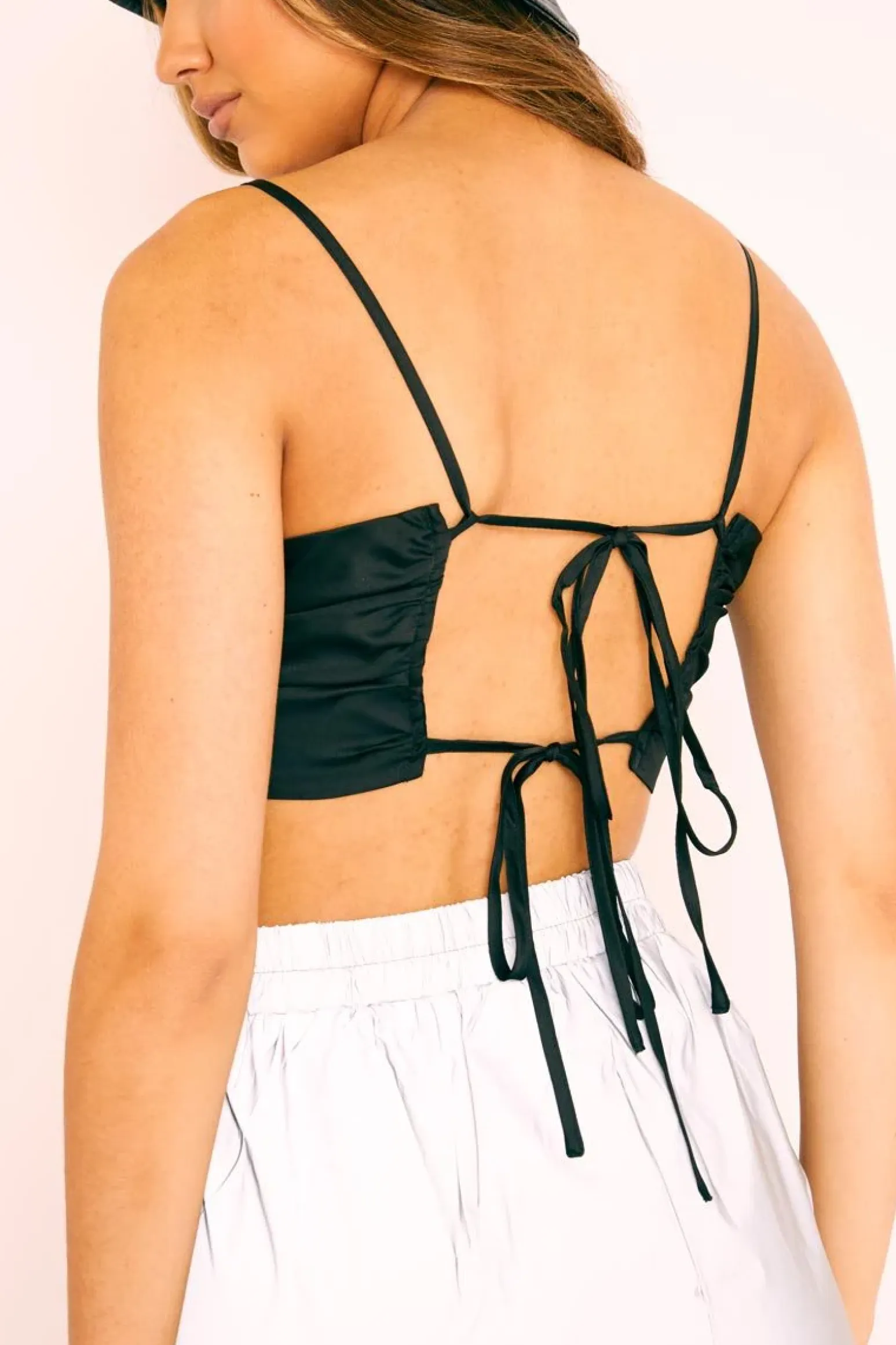 Rebellious Fashion Black Satin Bow Tie Back Crop Top - Jeylin