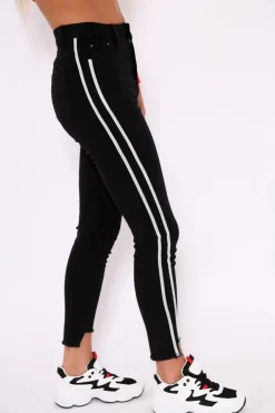 Rebellious Fashion Black Side Stripe Dip Hem Skinny Jeans - Tinlee