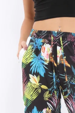 Rebellious Fashion Black Tropical Print Wide Leg Trousers - Ezrie