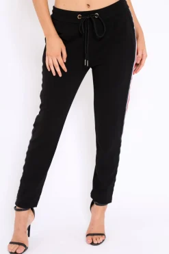Rebellious Fashion Black Trousers with Red and White Side Stripe - Savanna