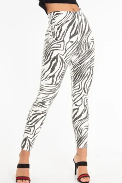 Rebellious Fashion Black White Animal Print Faux Leather Leggings - Quinn