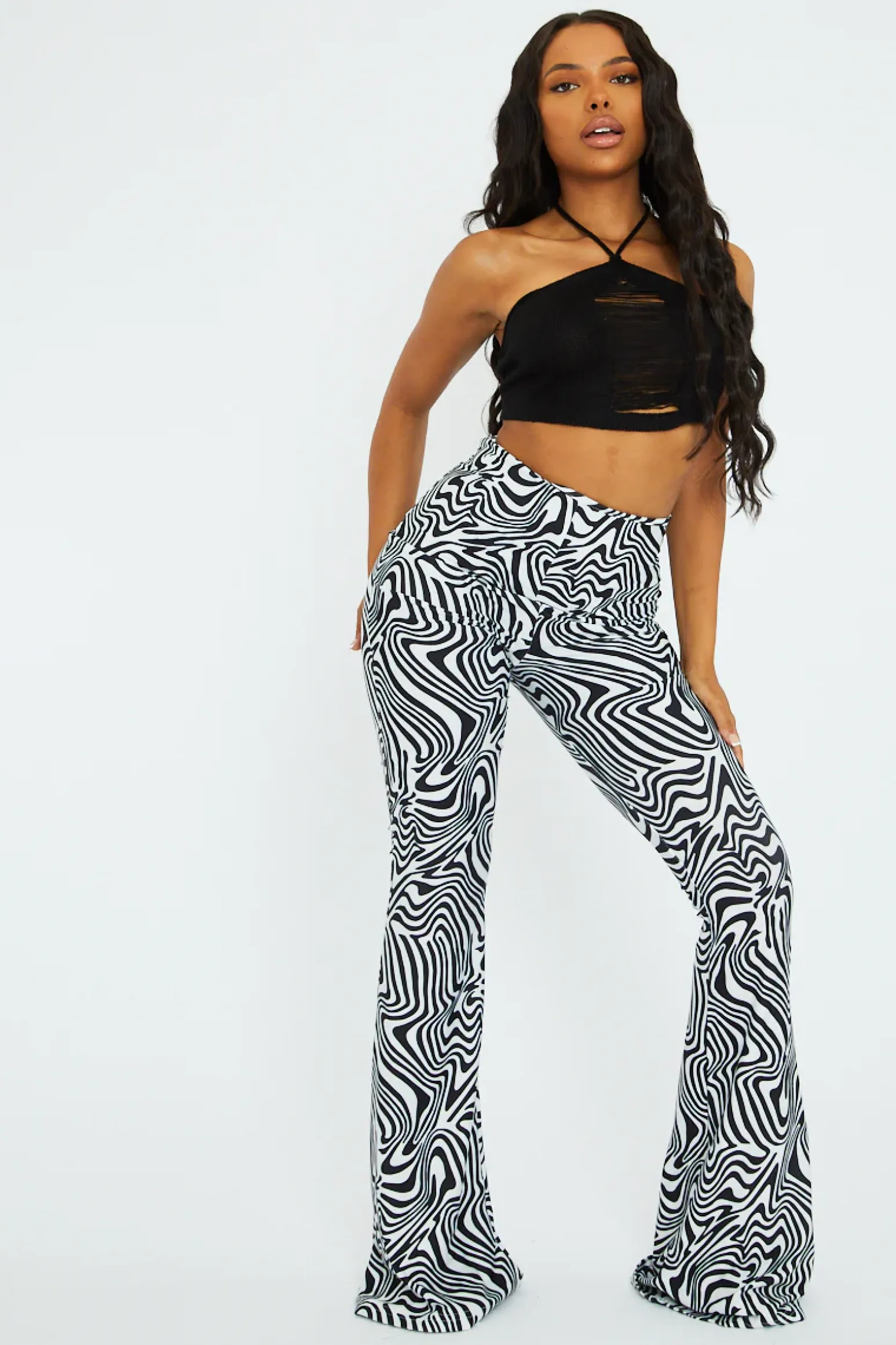 Rebellious Fashion Black White Wave Print Slinky Flare Trousers - Ila