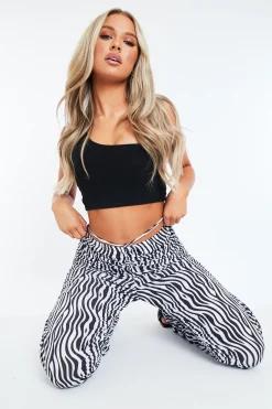 Rebellious Fashion Black White Zebra Print Slinky Ruched Leg Trousers - Vanna