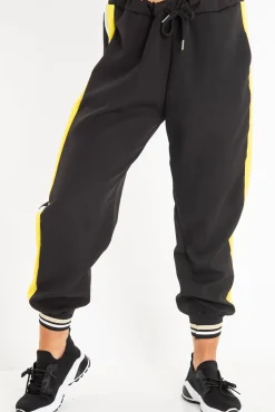 Rebellious Fashion Black Yellow Cuffed Hem Tie Waist Joggers - Kaci