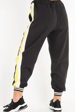 Rebellious Fashion Black Yellow Cuffed Hem Tie Waist Joggers - Kaci