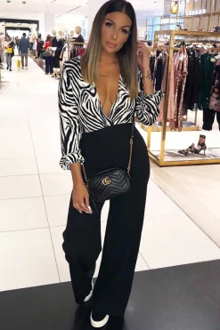 Rebellious Fashion Black Zebra Print Plunge Long Sleeved Bodysuit - Macee
