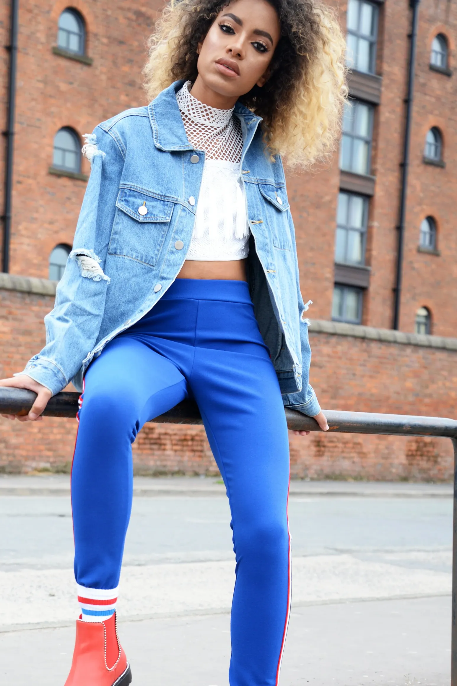 Rebellious Fashion Blue Distressed Denim Jacket - Friya