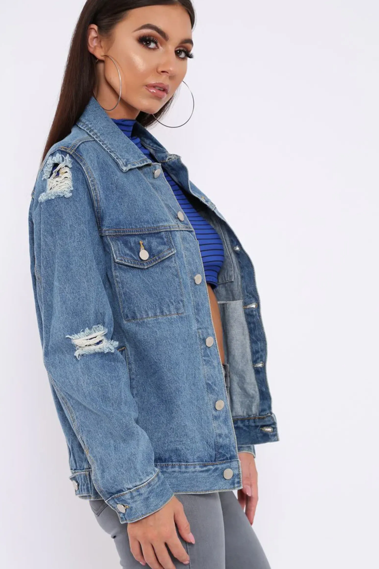 Rebellious Fashion Blue Distressed Denim Jacket - Friya