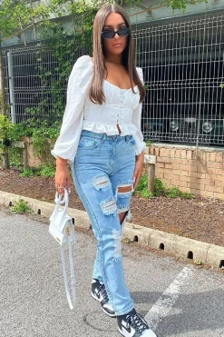 Rebellious Fashion Blue Extremely Ripped Denim Mom Jeans - Ellynor