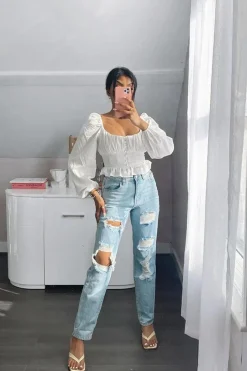 Rebellious Fashion Blue Extremely Ripped Denim Mom Jeans - Ellynor