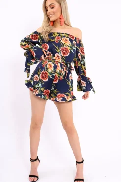 Rebellious Fashion Blue Floral Bardot Playsuit with Frill Hem and Cuffs - Farhanna