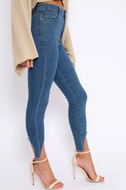 Rebellious Fashion Blue Mid Wash Split Hem Skinny Jeans - Raizy