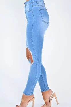 Rebellious Fashion Blue Ripped Knee Skinny Jeans - Chanelle