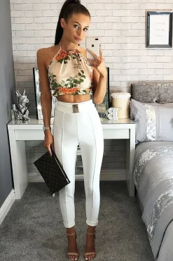 Rebellious Fashion Cream Floral Halterneck Backless Crop Top - Aarin