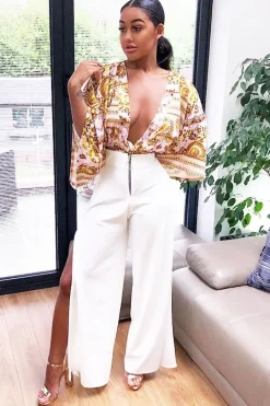 Rebellious Fashion Cream Zip Front High Waisted Flare Trousers - Gerta