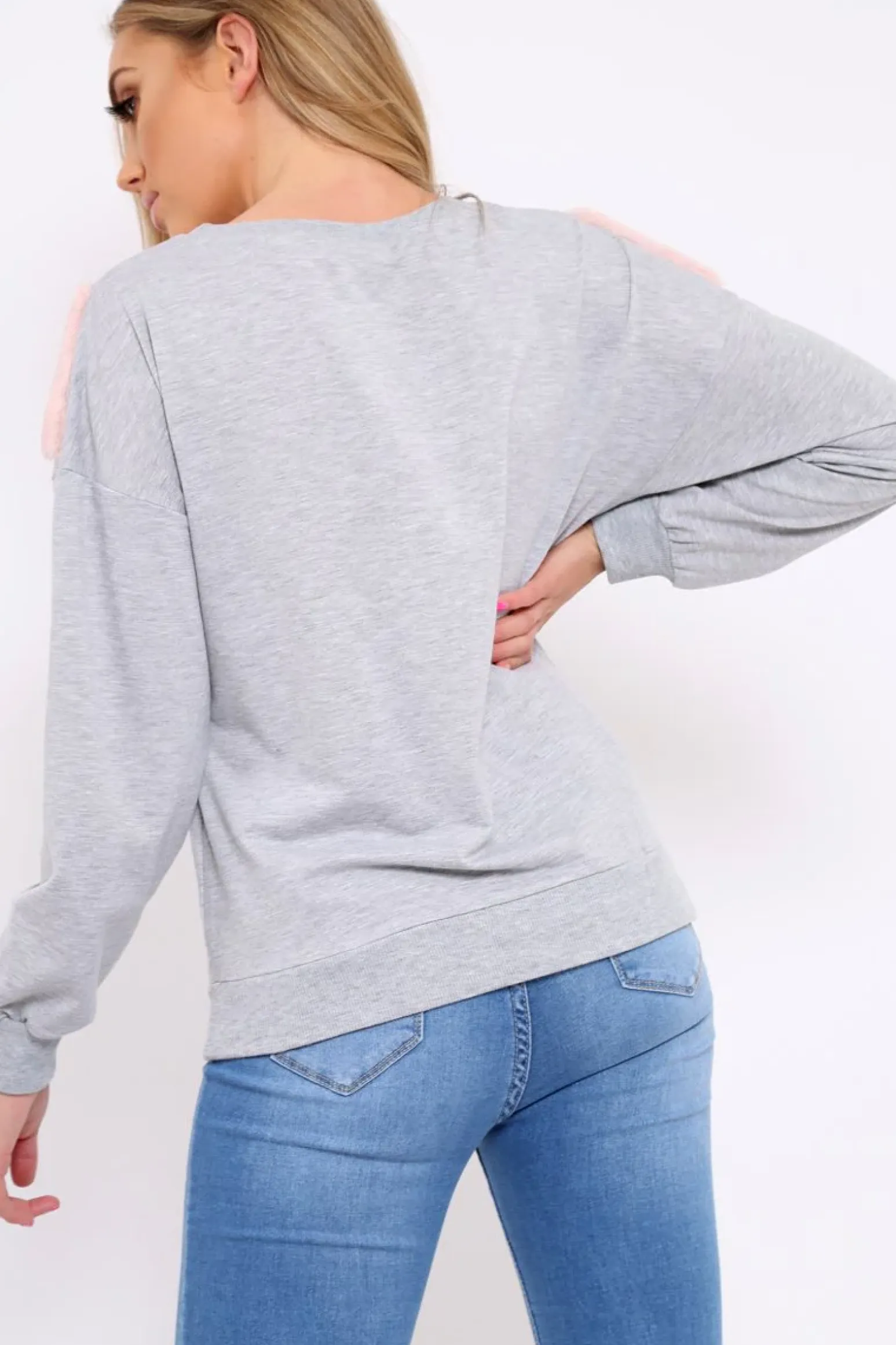 Rebellious Fashion Grey Jumper with Fur and Pearl Front - Annita