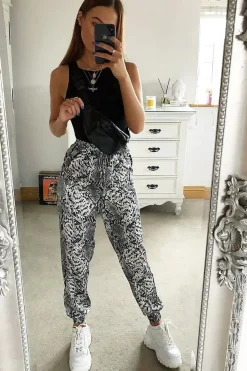 Rebellious Fashion Grey Snake Print Tie Waist Cuffed Trousers - Annica