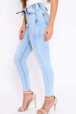 Rebellious Fashion Light Blue Denim Ripped Lace Up Jeans - Zadee