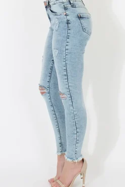 Rebellious Fashion Light Denim Ripped Jeans - Morgan