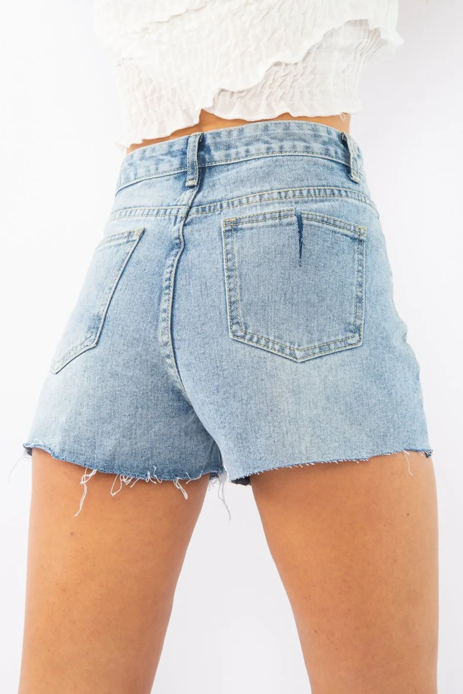 Rebellious Fashion Light Wash Ripped Denim Shorts - Bexlie