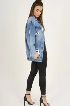 Rebellious Fashion Mid Blue Oversized Badge Detail Denim Jacket - Leila