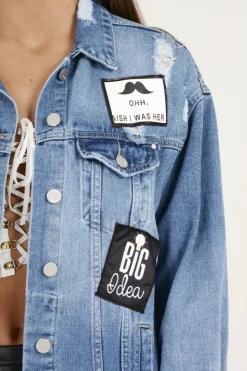 Rebellious Fashion Mid Blue Oversized Badge Detail Denim Jacket - Leila