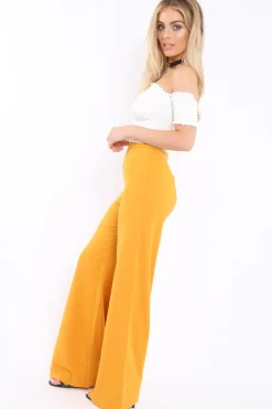 Rebellious Fashion Mustard High Waist Flare Trousers -Tisha
