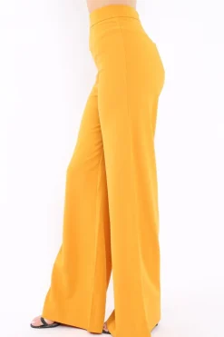 Rebellious Fashion Mustard High Waist Flare Trousers -Tisha