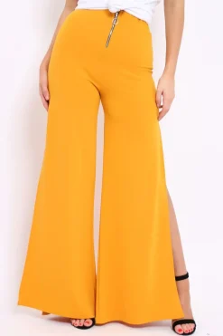 Rebellious Fashion Mustard Zip Front High Waisted Flare Trousers - Gerta