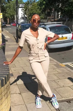 Rebellious Fashion Nude Woven Button Front Belted Jumpsuit - Suzanna