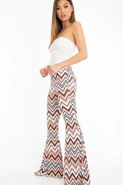 Rebellious Fashion Orange Black and White Zig-Zag Print Flared Trousers - Mianna