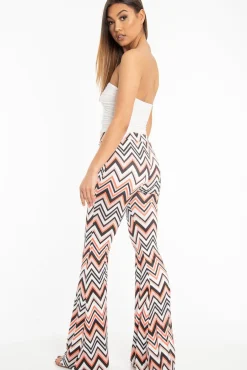 Rebellious Fashion Orange Black and White Zig-Zag Print Flared Trousers - Mianna