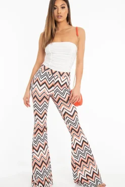 Rebellious Fashion Orange Black and White Zig-Zag Print Flared Trousers - Mianna